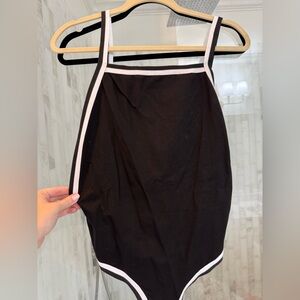 Super down by revolve black bodysuit with low back and white piping